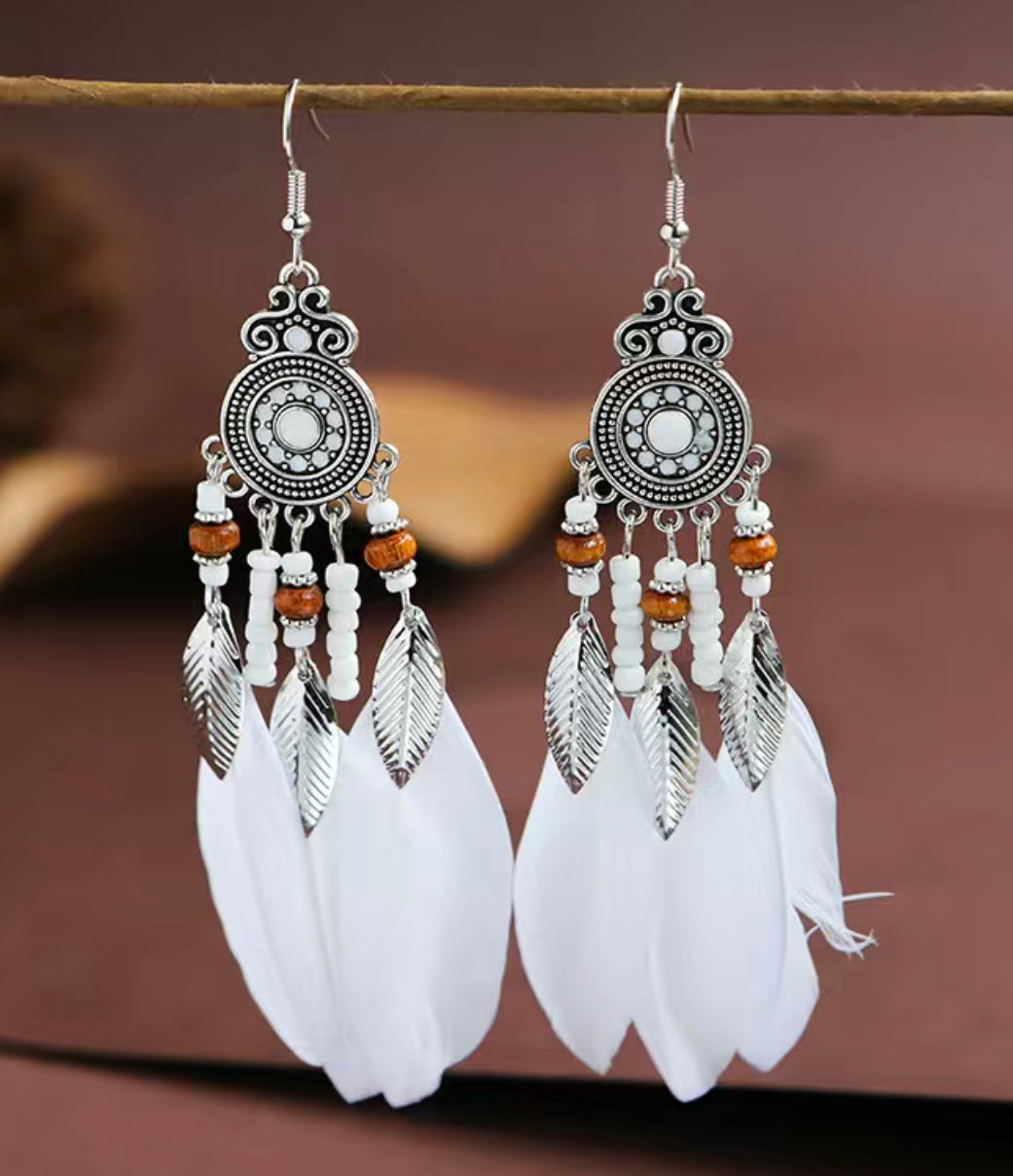 Plumas earings