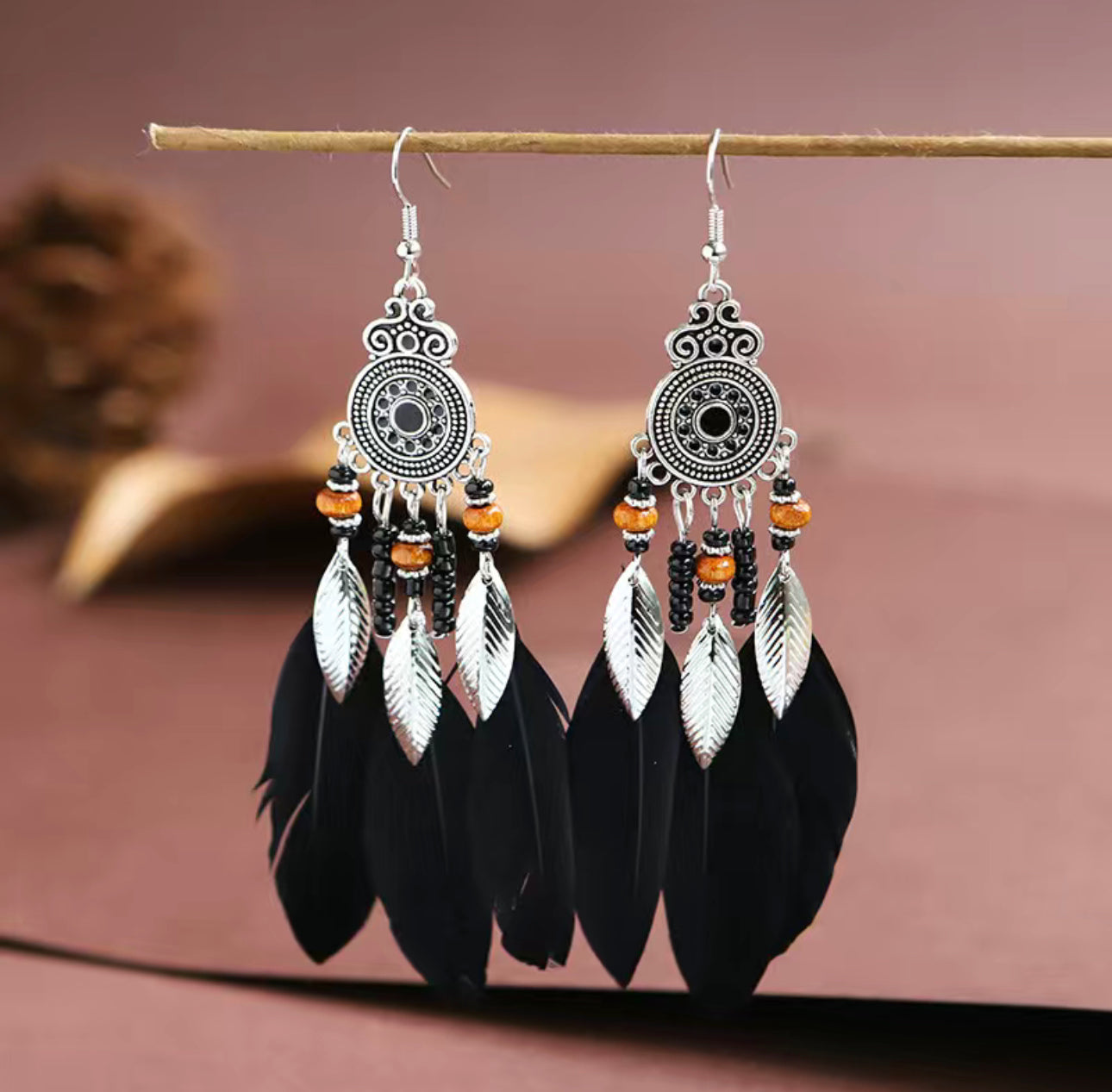 Plumas earings